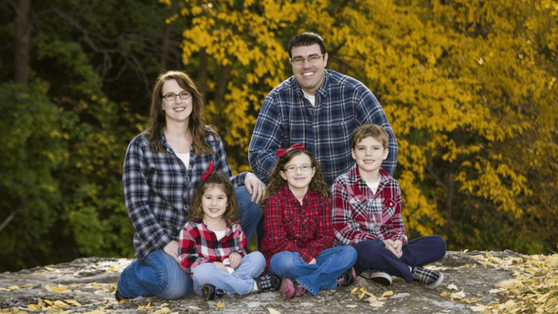 plaid and pattern play for outdoor fall family photo outfits